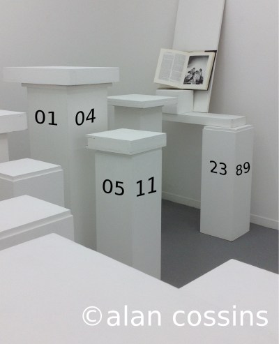 Plinths admiring the work of a famous artist